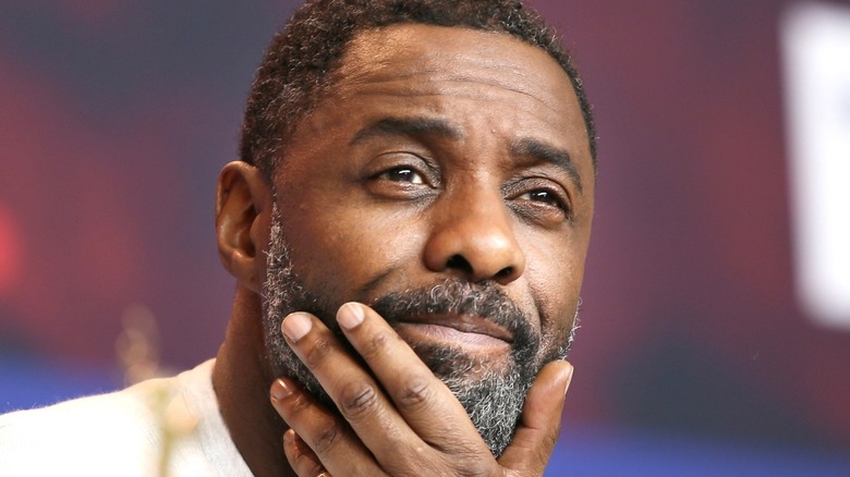 Idris Elba looking thoughtful