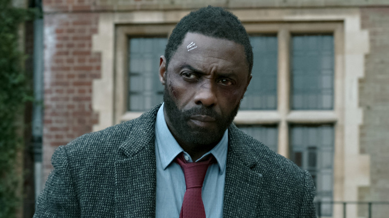 Luther looks on with suspicion