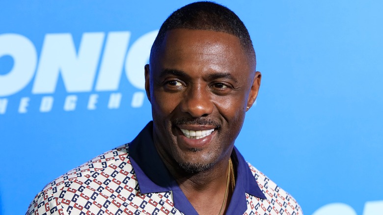 Idris Elba smiles