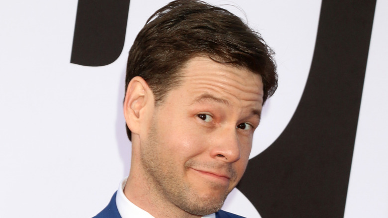 Ike Barinholtz side smiling