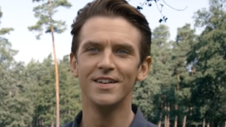 Dan Stevens standing in forest in I'm Your Man