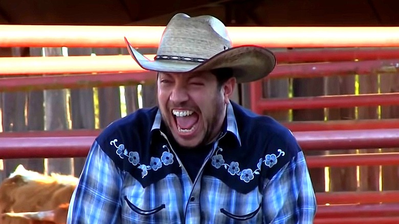 Sal in cowboy hat laughing
