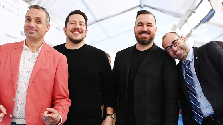 The Impractical Jokers smiling