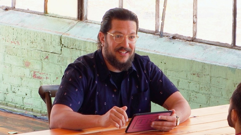 Sal Vulcano sitting at table