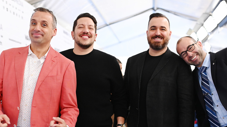 The Impractical Jokers smiling