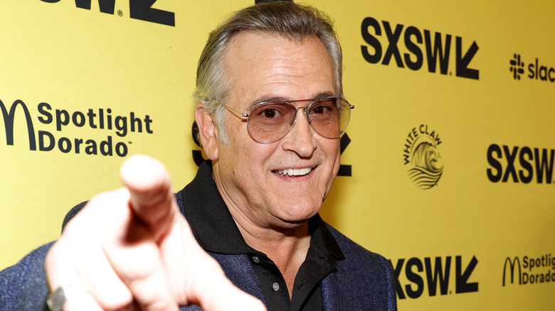 Bruce Campbell pointing at camera