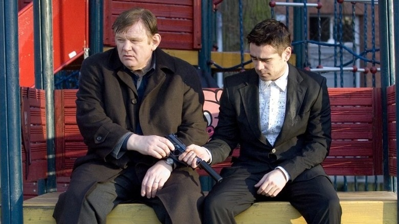 Colin Farrell and Brendan Gleeson in a kid's park