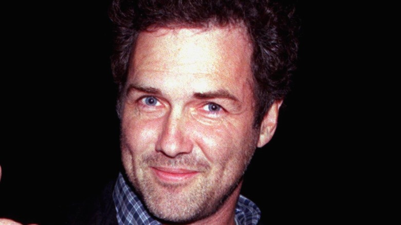 Norm MacDonald smiles