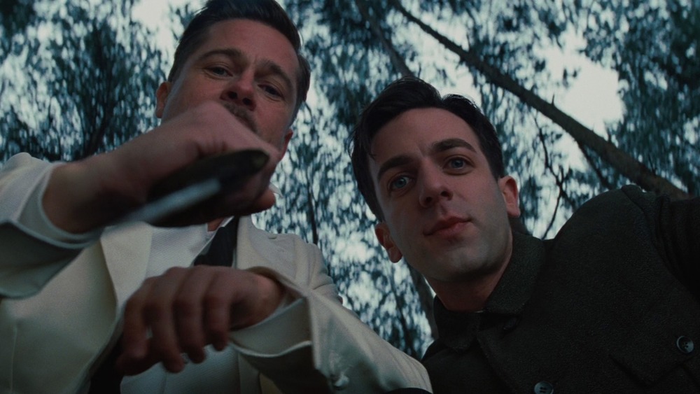 Brad Pitt and BJ Novak hold a knife in Inglourious Basterds