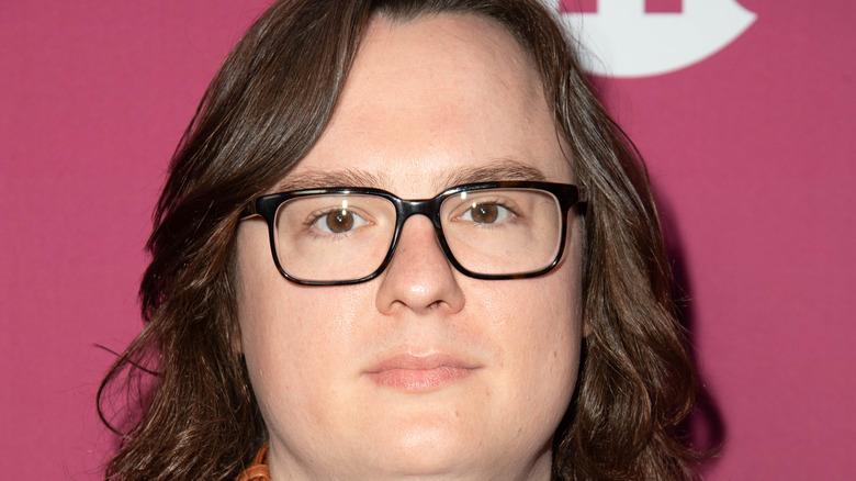 Clark Duke smiling with glasses