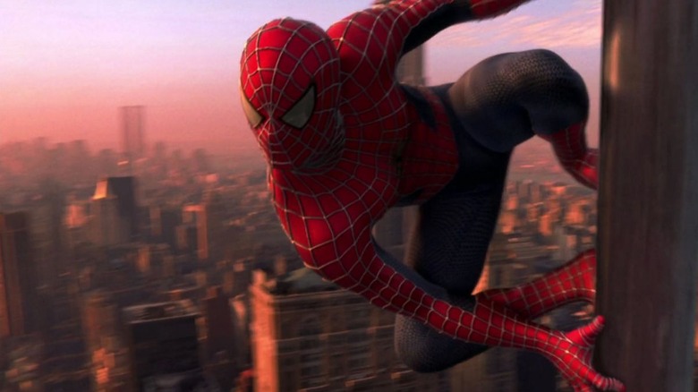 Spider-Man sticks to a building