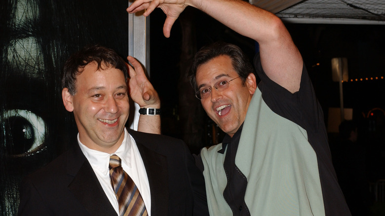 Sam Raimi and Bruce Campbell joking around