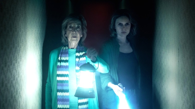 Gemma and Elise in a hallway in the Further in "Insidious: Out of the Further" (2026)