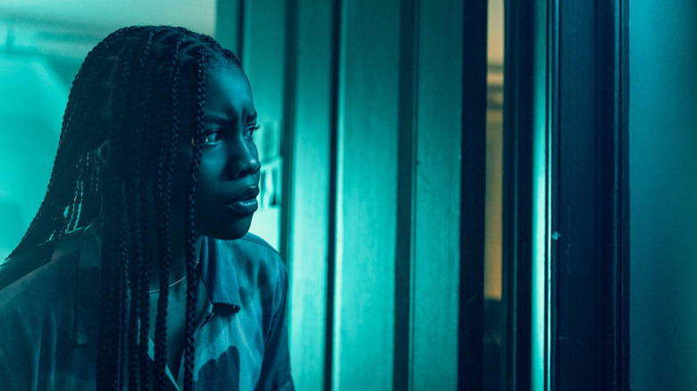 Chris looking into hallway