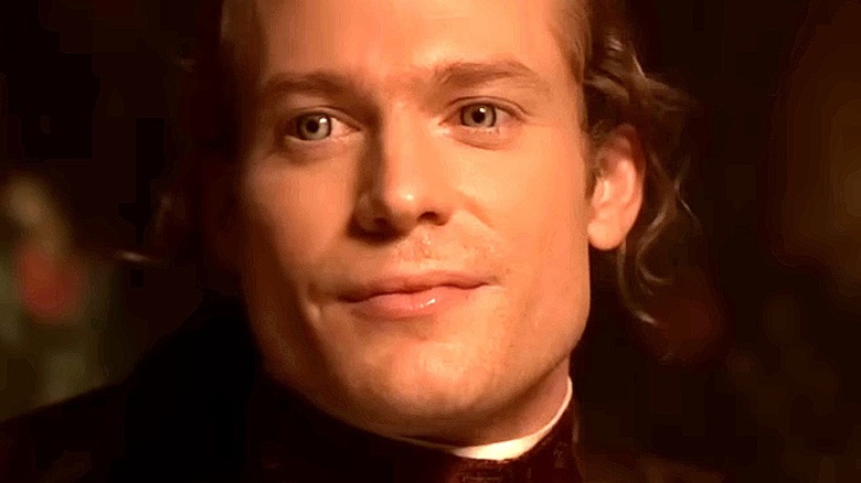 Lestat shows off a smug smile in Interview with the Vampire