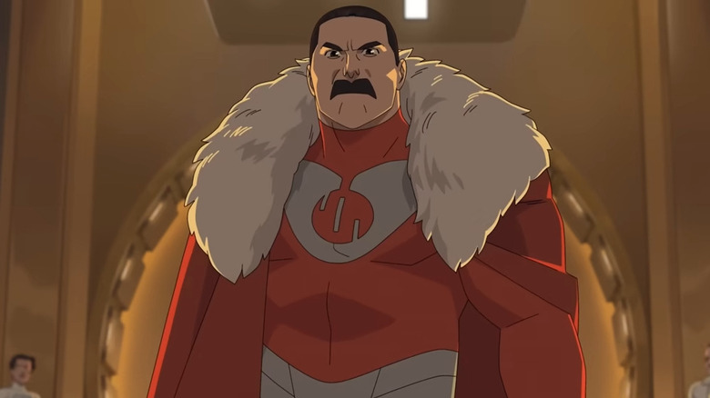 Thragg standing ominously on "Invincible" (2026)