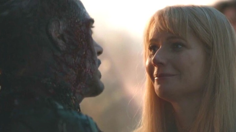 Pepper Potts cries next to Tony Stark