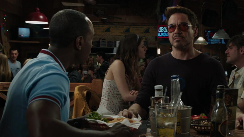 Tony and Rhodey eat