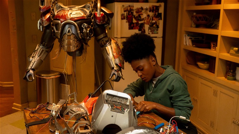 Riri Williams working on robotics in her kitchen in 