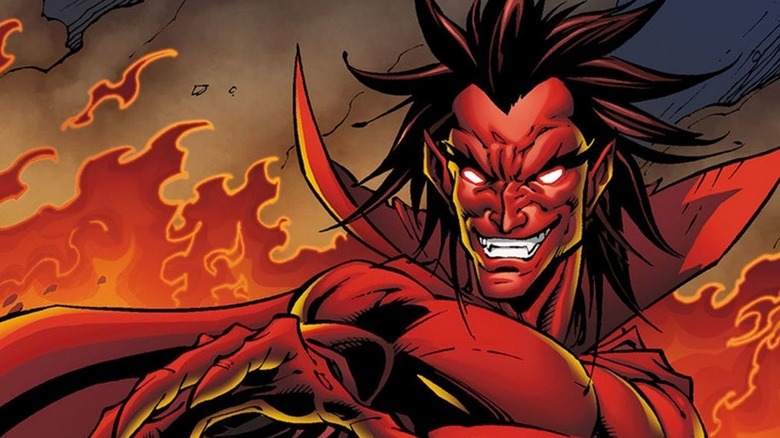 Mephisto holds out his hand standing amidst flames