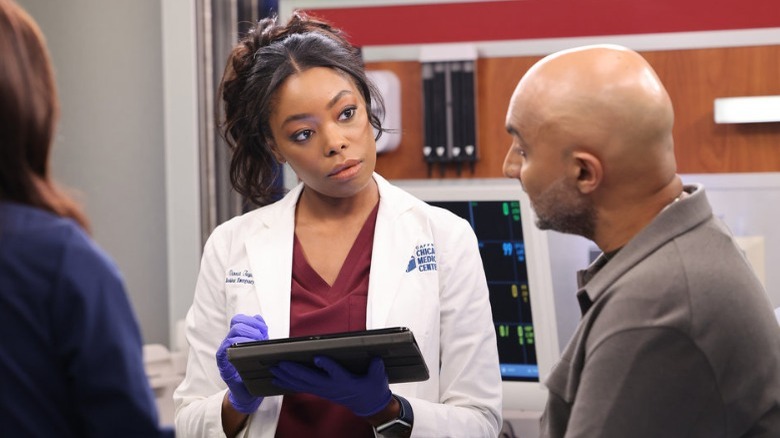 Vanessa talking to patient