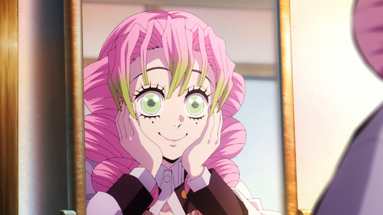 Mitsuri smiles in the mirror