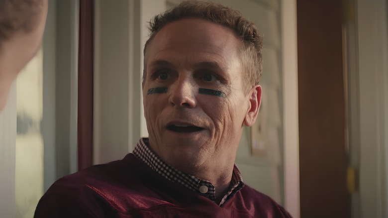 CJ's dad wearing eye black