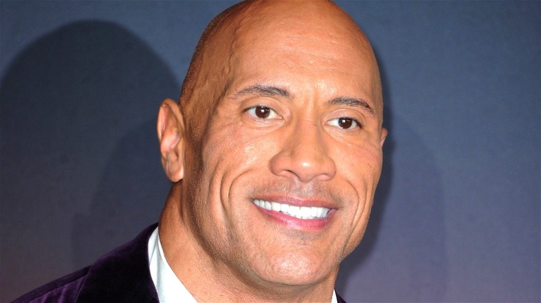 Dwayne "The Rock" Johnson smiling at event 
