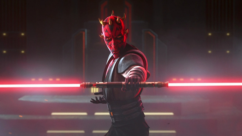 Darth Maul wields his double bladed lightsaber