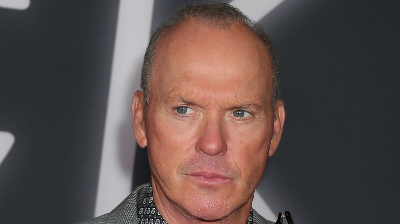 Michael Keaton looks skeptical on a red carpet