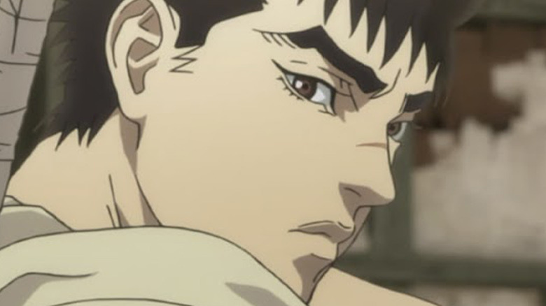 Berserk Guts looking over shoulder