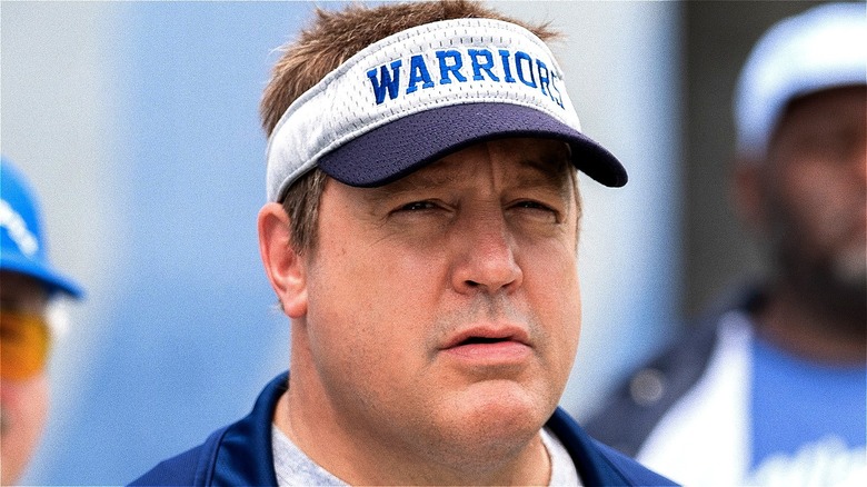 Kevin James wears blue visor