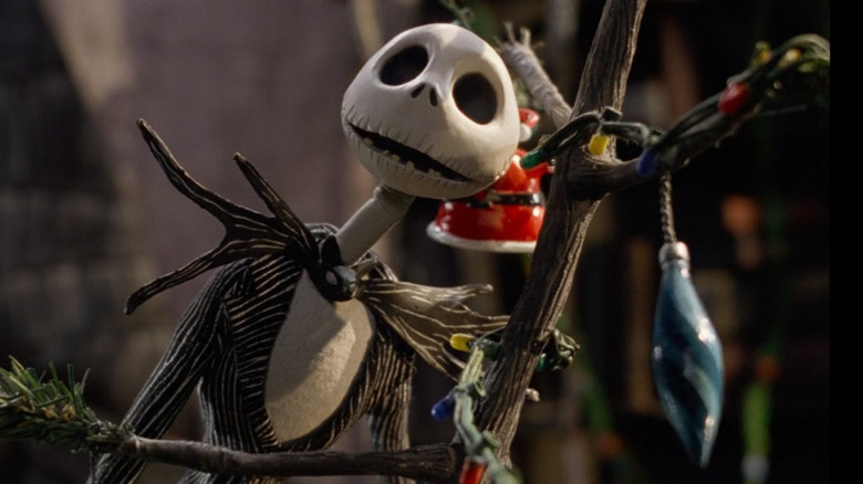 Jack Skellington hugging Christmas tree