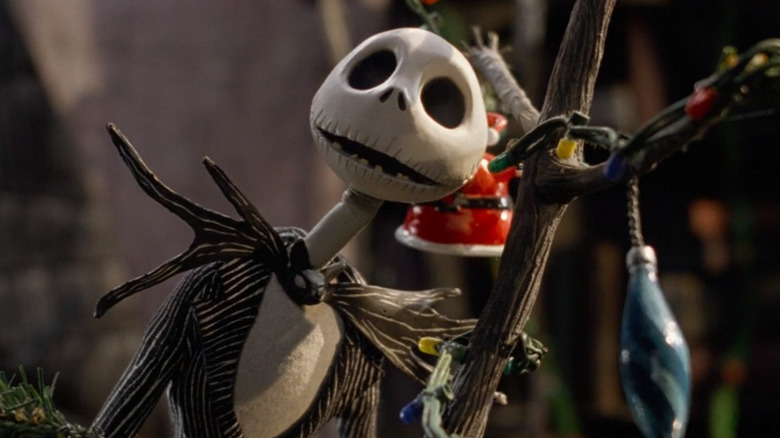 Jack Skellington hugging Christmas tree