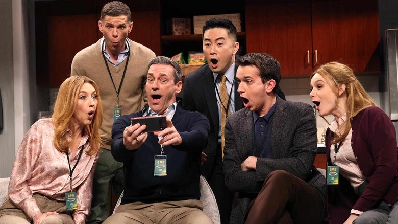 The cast of SNL in a sketch with Jon Hamm