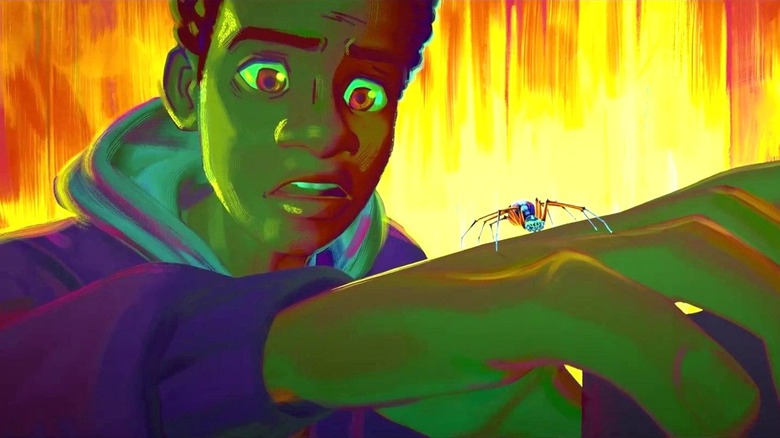 Miles Morales looking at the spider on his hand in Spider-Man: Across the Spider-Verse