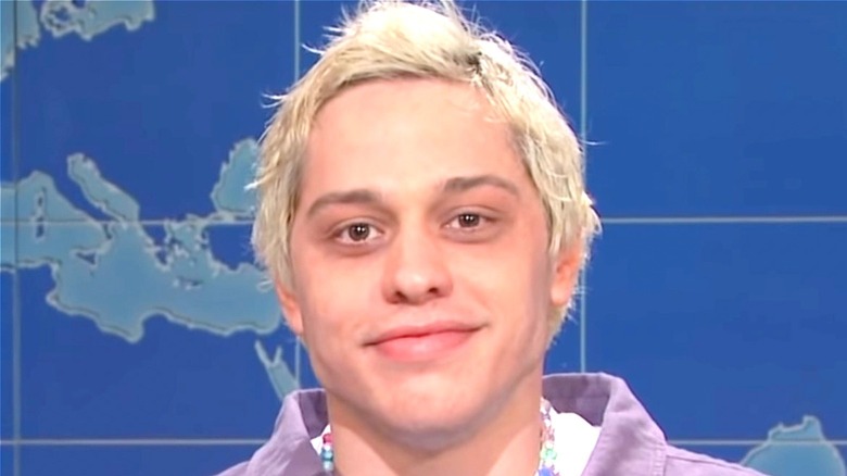 Pete Davidson smiles on Saturday Night Live