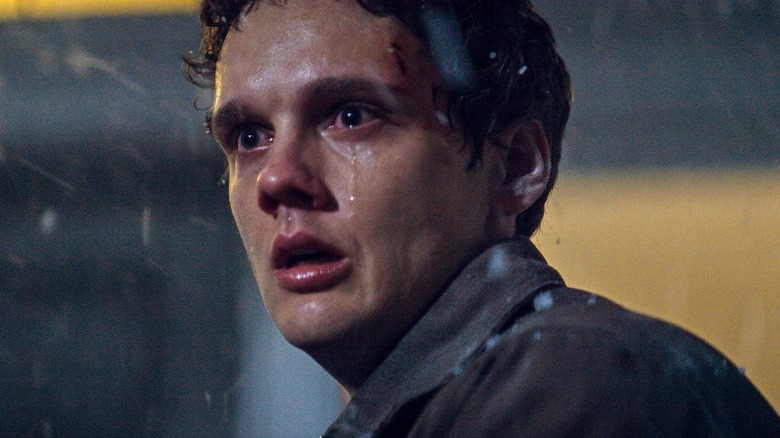 A tearful Joseph looks horrified in "Evil Dead Burn" (2026)