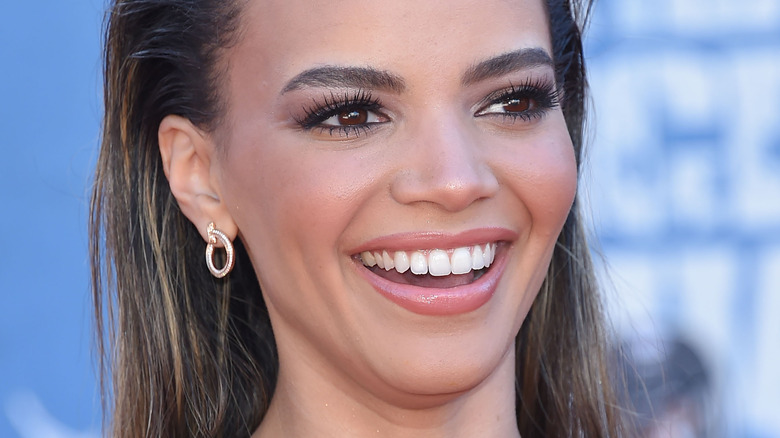 Leslie Grace attending premiere 