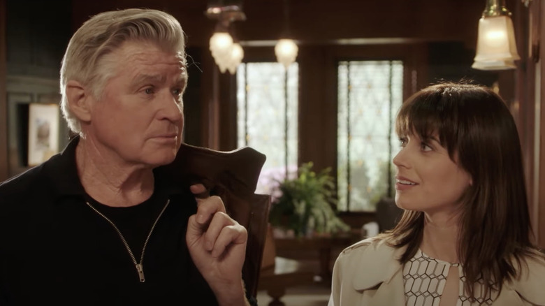 Treat Williams carrying jacket in Chesapeake Shores