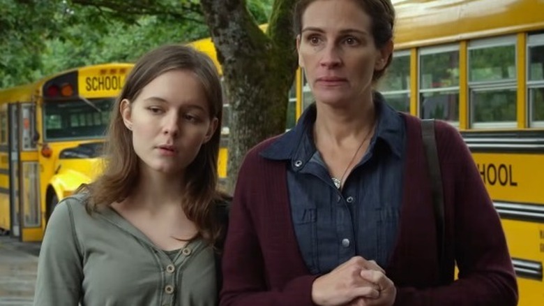 Via and Isabel looking concerned for Auggie