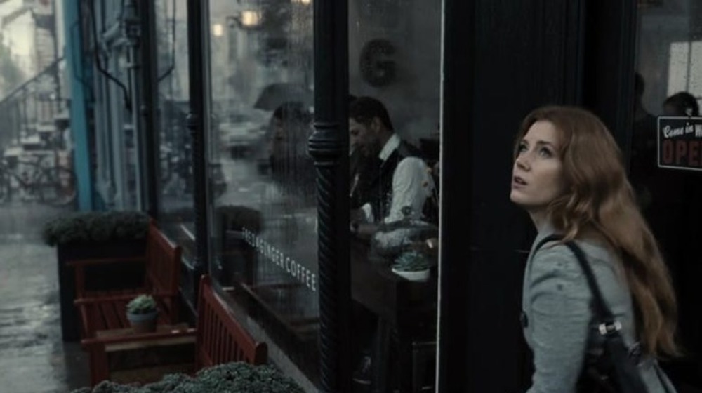 Zack Snyder sitting in a coffee shop
