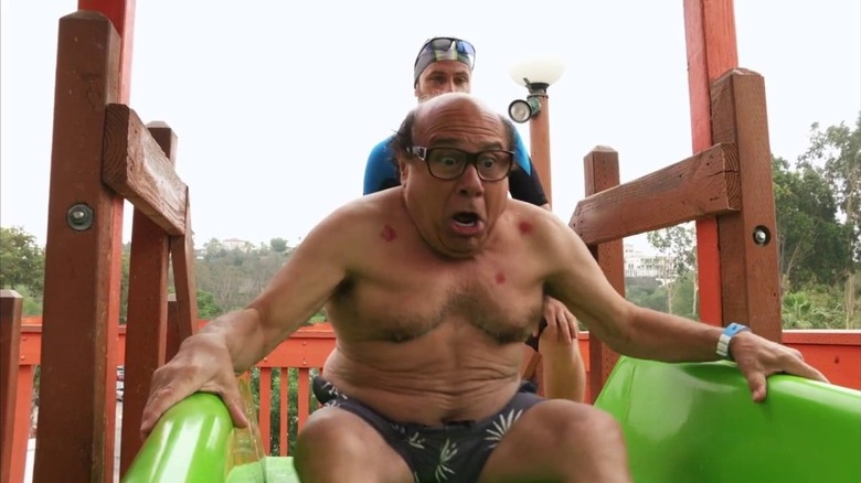 Frank goes down a waterslide in "It's Always Sunny in Philadelphia"