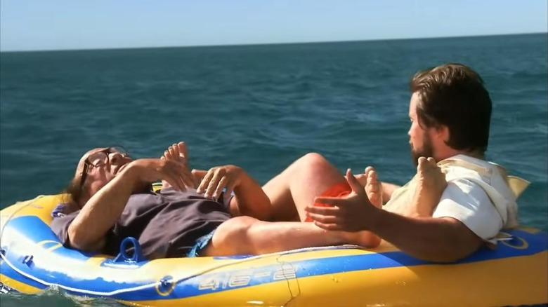 Frank and Mac on a raft in the ocean in "It's Always Sunny in Philadelphia"