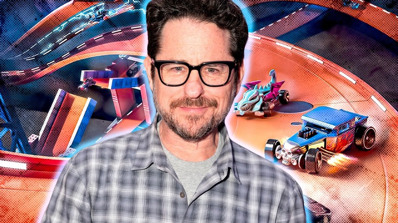 JJ Abrams surrounded by Hot Wheels