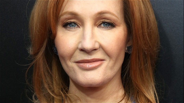 J.K. Rowling smirking