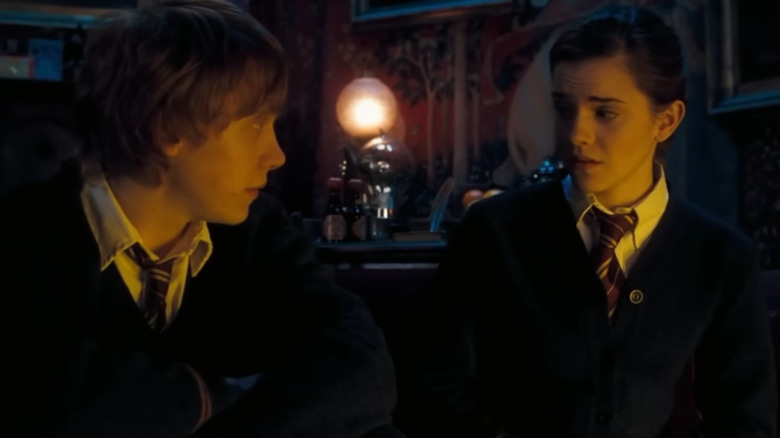 Ron looking at Hermione