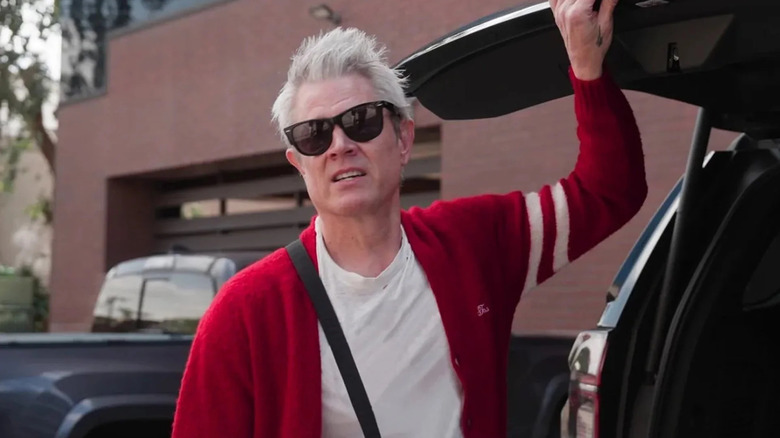 Johnny Knoxville closing a car trunk in Jackass: Best & Last (2026)