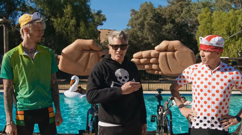 Johnny Knoxville explains the rules of "Bicycle Backhand" to Machine Gun Kelly and Steve-O