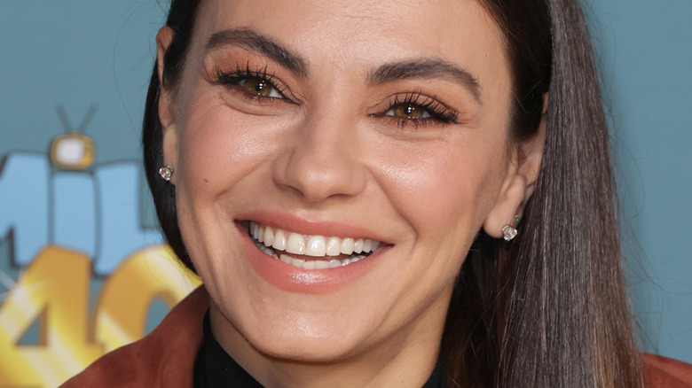 Mila Kunis smiling 